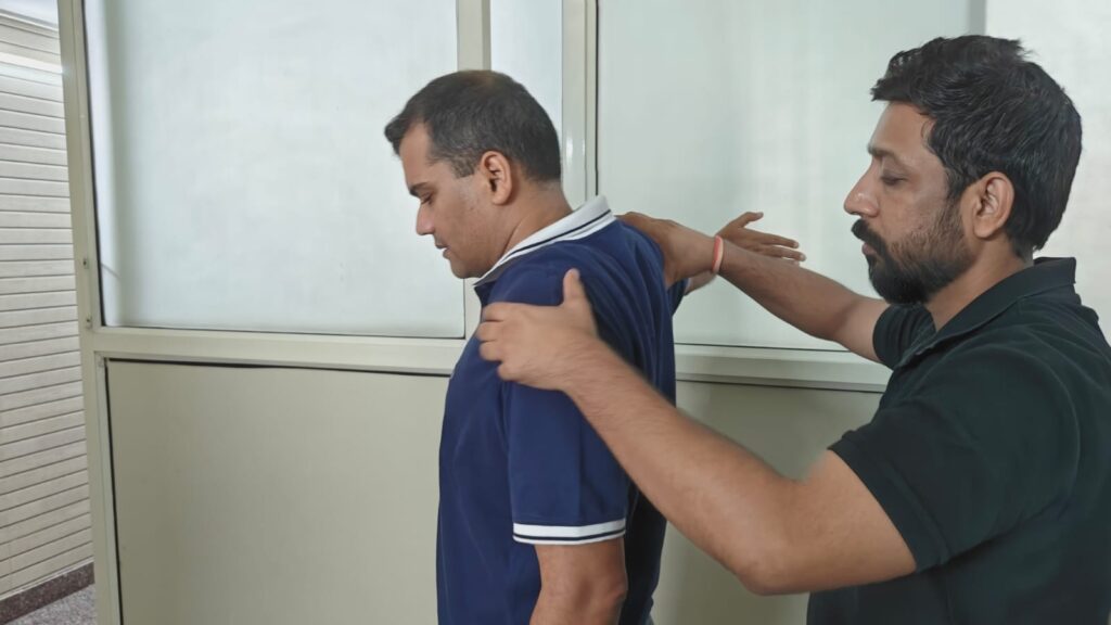 Physiotherapist performing cervical spine therapy for cervical pain relief in Greater Noida